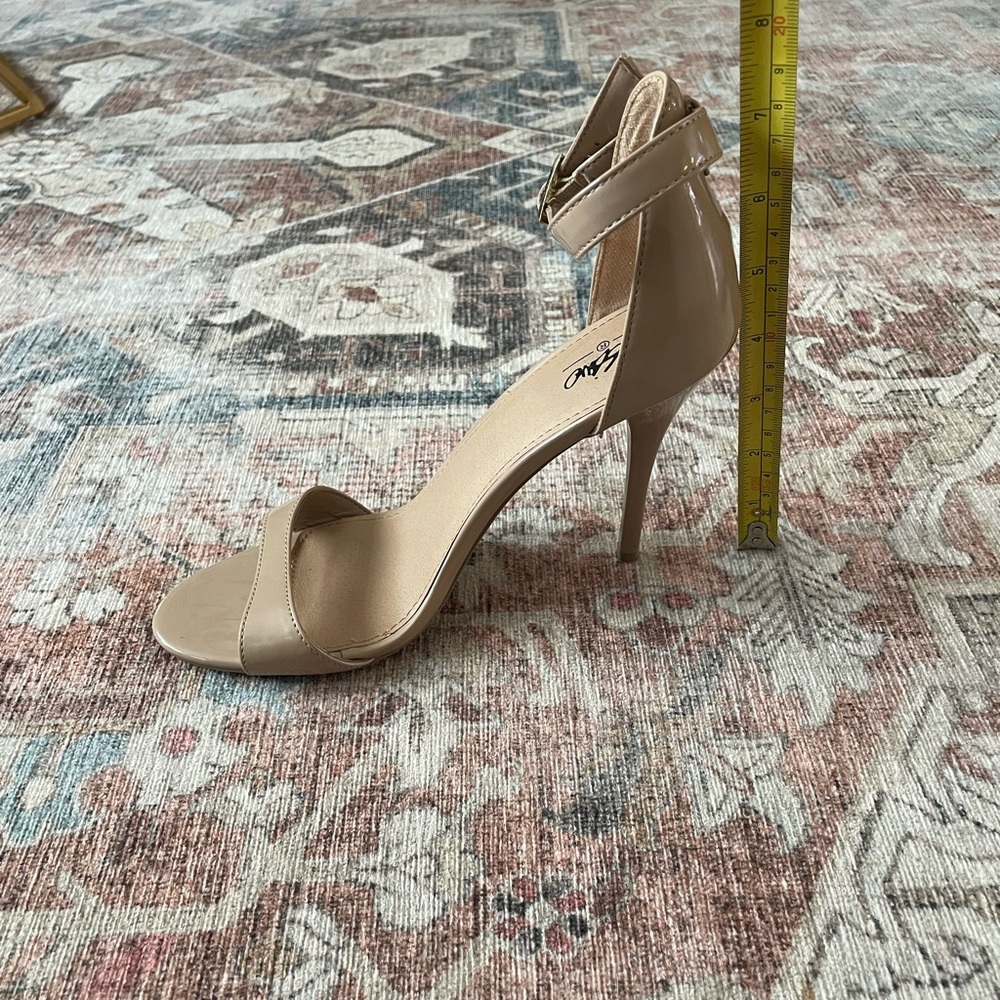 Nude, size 8, strappy pumps